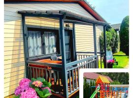 AIDA Domki Letniskowe - domki 5 min od MORZA - Plac Zabaw & ANIMACJE dla DZIECI, ROWERY gratis dla Gości, hotell i Rewal