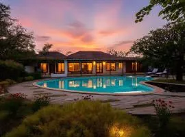 Wander Beyond by StayVista - Featuring a Bali-themed abode and a refreshing swimming pool
