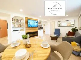 Your modern Northwest Hideaway Suite with cozy fireplace