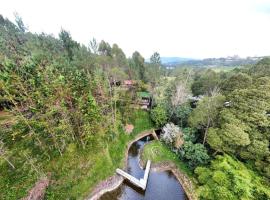Cabaña en el Lago Cerca MetroCable ARVI, hotell sihtkohas Guarne