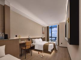 杏子酒店上饶市吾悦广场店 Xingzi Hotel Shangrao Wuyue Plaza Branch โรงแรมในFantou