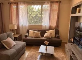 Apartment with gardens near the airport