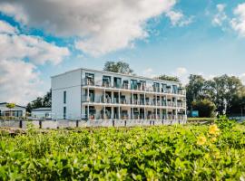 Marina Martinshafen - Lotsenhaus, Hotel in Neuhof
