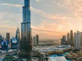 GRANDE SIGNATURE RESIDENCES with Burj Khalifa balcony view and Private Fountain Show with DXB AIRPORT VIP Shuttle option