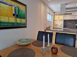 Central,free parking and 10 min walk to train station, hotel a Drammen