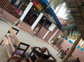 Dizzy Lizzies Beach House Resort, hotel em Kokrobite