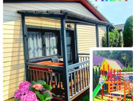 AIDA Domki Letniskowe - domki 5 min od MORZA - Plac Zabaw & ANIMACJE dla DZIECI, ROWERY gratis dla Gości، فندق في ريفال