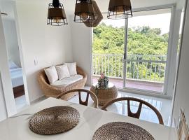 Nativa Park Suites, Escapada Perfecta con Jacuzzi Privado y Naturaleza, מלון בוייטה