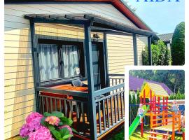 AIDA Domki Letniskowe - domki 5 min od MORZA - Plac Zabaw & ANIMACJE dla DZIECI, ROWERY gratis dla Gości, khách sạn ở Rewal