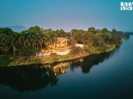 StayVista at Maison Vera with Pool, River front view