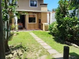 Apartamento duplex con jardín