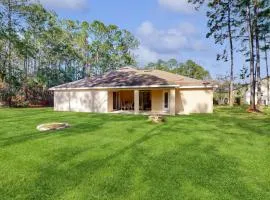 Luxury home with open layout, smart TVs, patio, & alfresco dining