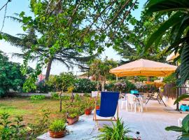 Casa Primula - Family Country House immersa nel verde a 5 min dal Mare, hotel a Ricadi