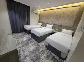 فندق نخبة الجوار, hotel i Al Khansāk