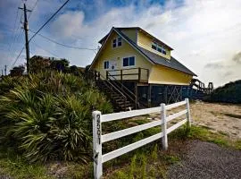 A-frame beach house steps from the ocean with deck & central AC