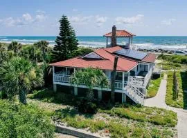 Sunny oceanfront home with balcony, full kitchen, central AC, & washer/dryer