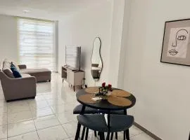 Exclusivo Departamento en vía a la costa, 2 Hab, Parqueo Privado