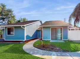 Water-view dog-friendly home with outdoor space & entertainment options