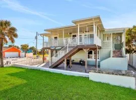 Updated home across from beach with covered balcony, central AC, & washer/dryer