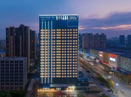 Orange Crystal Hotel Wuhan Jinyinhu โรงแรมในDongxihu
