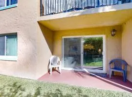Ground-floor condo by the beach with on-site pool, tennis, & private patio