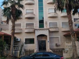 الرائد للشقق المفروشة, acomoda&ccedil;&atilde;o com cozinha em Am&atilde;