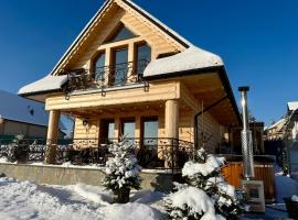 Osada Snozka - domki w g&oacute;rach z balią i kominkiem, chalet de monta&ntilde;a en Kluszkowce