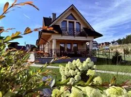 Osada Snozka - domki w górach z balią i kominkiem