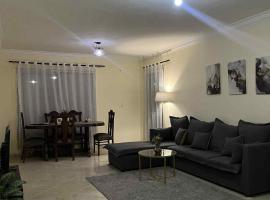 Cozy shared apartment, hôtel à New cairo