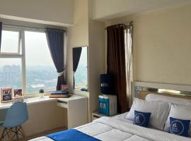 Margonda Residence By Ensroom id, hotel v destinácii Kemirimuka Dua