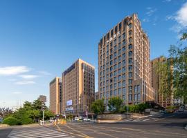 Weihai में, होटल Orange Crystal Hotel Weihai Happiness Gate Weigao Plaza