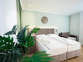 Living Inn am Schlosspark - Zentral, Parkplatz und Kitchenette, hotel v mestu Rheda-Wiedenbrück
