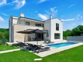 Holiday Home Modern 300m² Villa - King Beds and Leisure Zone by Interhome