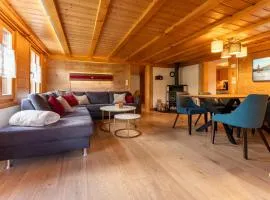 Chalet Rösi - Ferienwohnung mit Hot Pot & Bergsicht