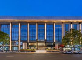 Orange Crystal Hotel Yantai Binhai Square, hotel v destinaci Jen-tchaj