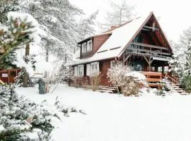 Dom Zielarki z widokiem na jezioro, sauna, balia