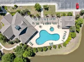 Dreamy lakefront escape on 18th fairway with pools, tennis, & elevator