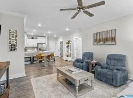 Centrally located condo with a patio, W/D, & AC - pool and on-site golf access