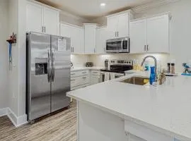 Coastal home near golf courses with shared pool and tennis courts