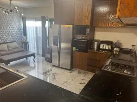 Depto para 5 cerca de aeropuerto Cocina amplia AC