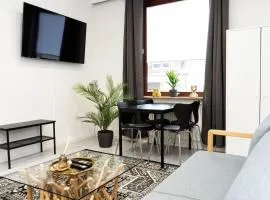 Central - Box spring bed - 5 sleeping places - 3 TVs - kitchen -wifi