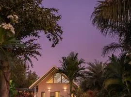 SaffronStays Eden - 3BR vineyard-side pool villa with jacuzzi, farm dining, stargazing deck & lawns for celebrations