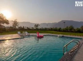 StayVista's Hillside Meadows - Mountainside Retreat with Farm View, Pool & Deck, Lawn & Gazebo