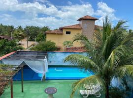 Casa para Temporada Frente P Praia com piscina ar cond、ノーヴァ・ヴィソザのホテル