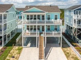 Waterfront retreat with private pool, beach access, fast WiFi & two decks