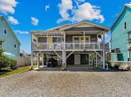 Waterfront home with Intracoastal views, outdoor areas, dock, & golf cart access