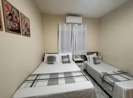 Casa há 4 minutos do centro + ar cond. e vaga