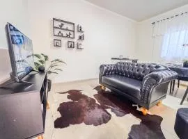 Flat completo em residencial + ar cond. e vaga