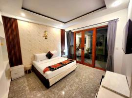 Ratu Guest House, hotel i Mantaak