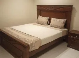 PECHS Guest House main shahra e Faisal Delhi sweets